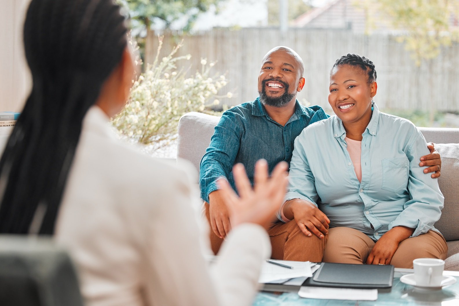 The best weve ever seen. Shot of a mature couple meeting with their insurance agent